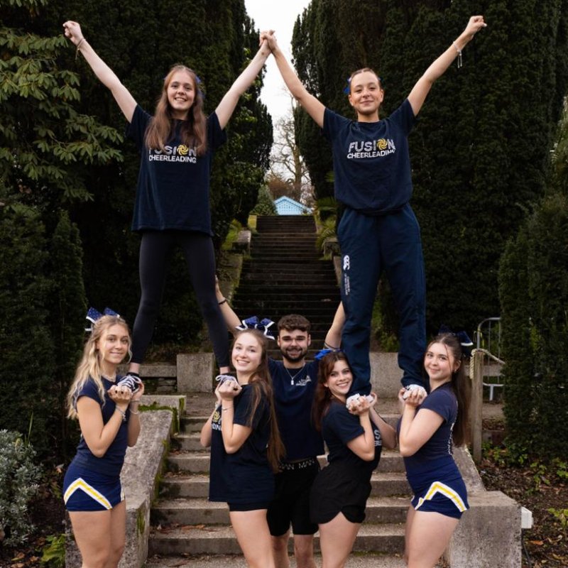 Students from Falmouth University's Cheerleading club in a pyramid