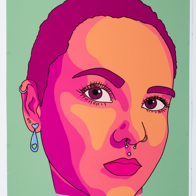 A tinted, 'pop-styled' image of a woman who wears a nose ring, earrings and a philtrum piercing