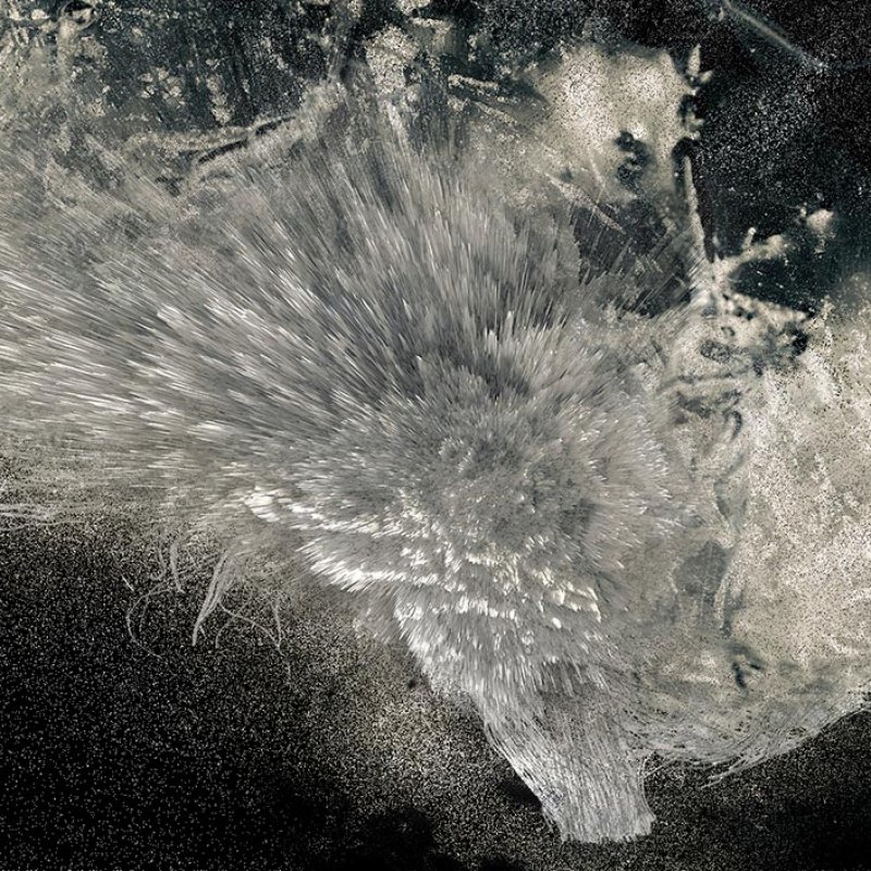 Photograph of ice on glass by Yas Crawford