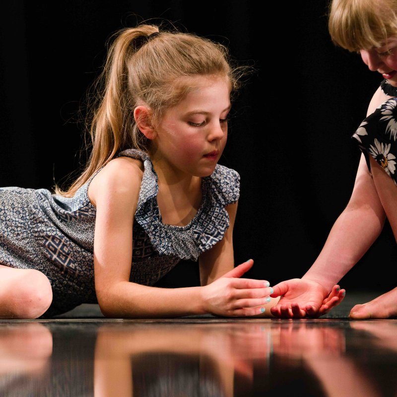 Two children dancing