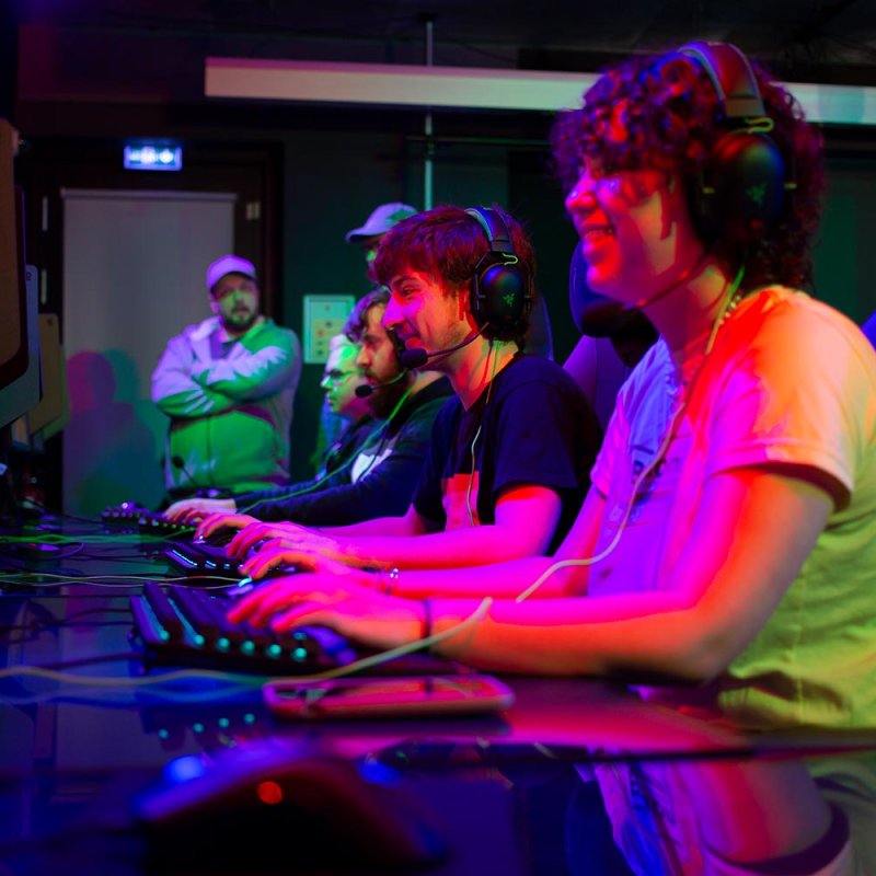 Falmouth University Esports students working at computers in an Esports studio