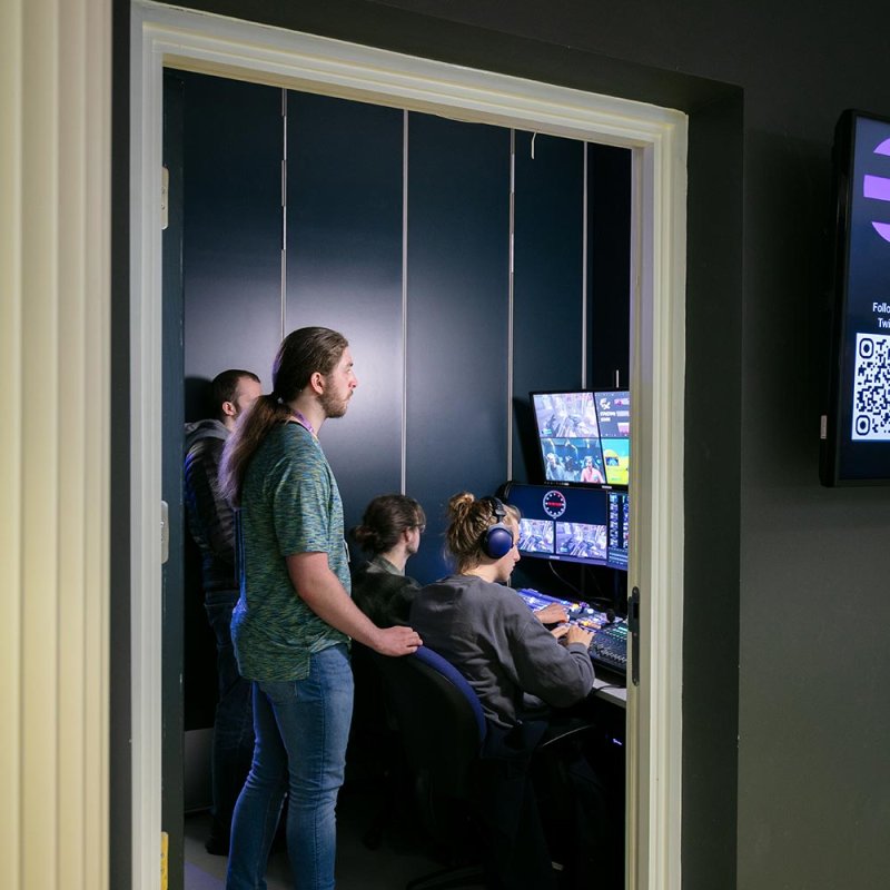 Doorway into an Esports studio at Falmouth University with on air sign