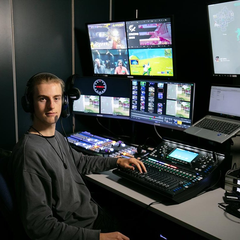 Two male students working in an Esports studio at Falmouth University