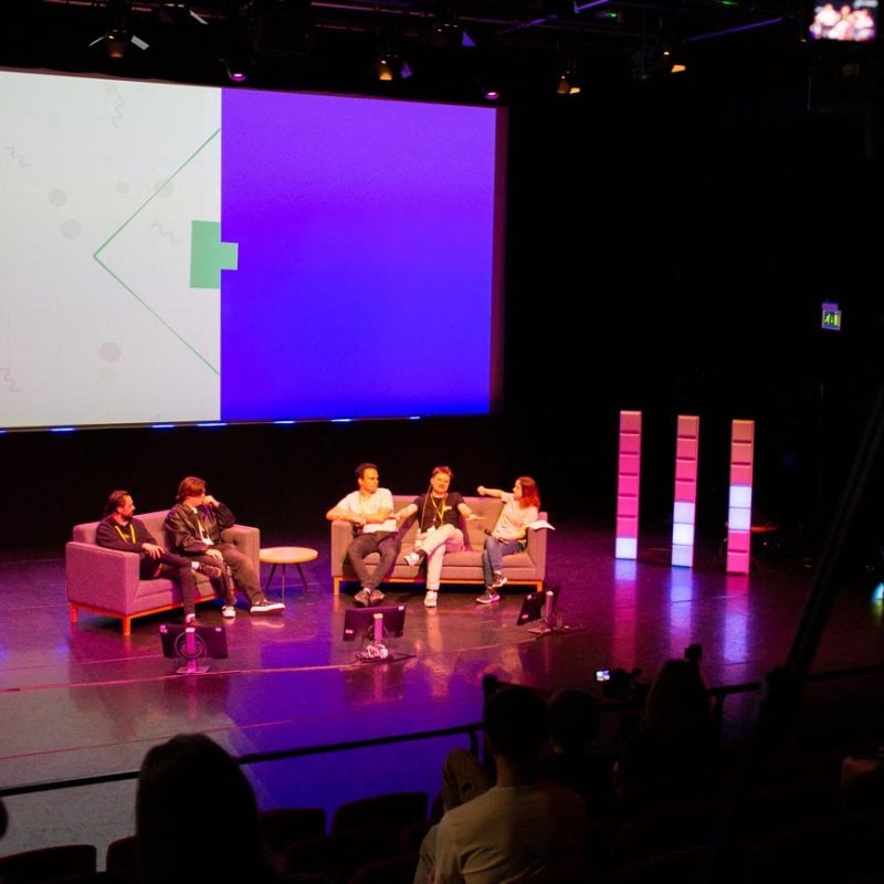 Panel of speakers on stage at the Falmouth University Games Expo 2025
