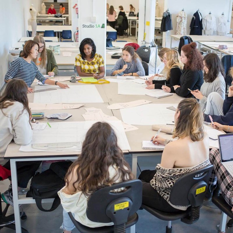 Fashion & Textiles students listening to academic staff