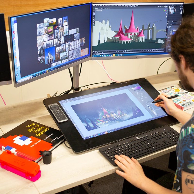 A Game Art student working at a drawing tablet