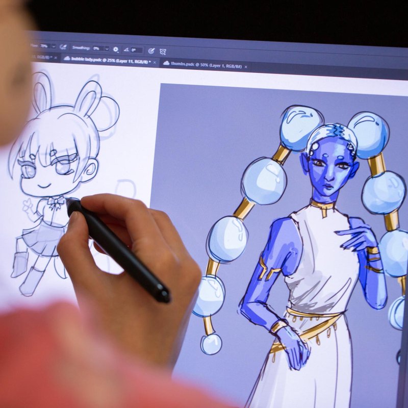 A Falmouth University Games student drawing on a screen