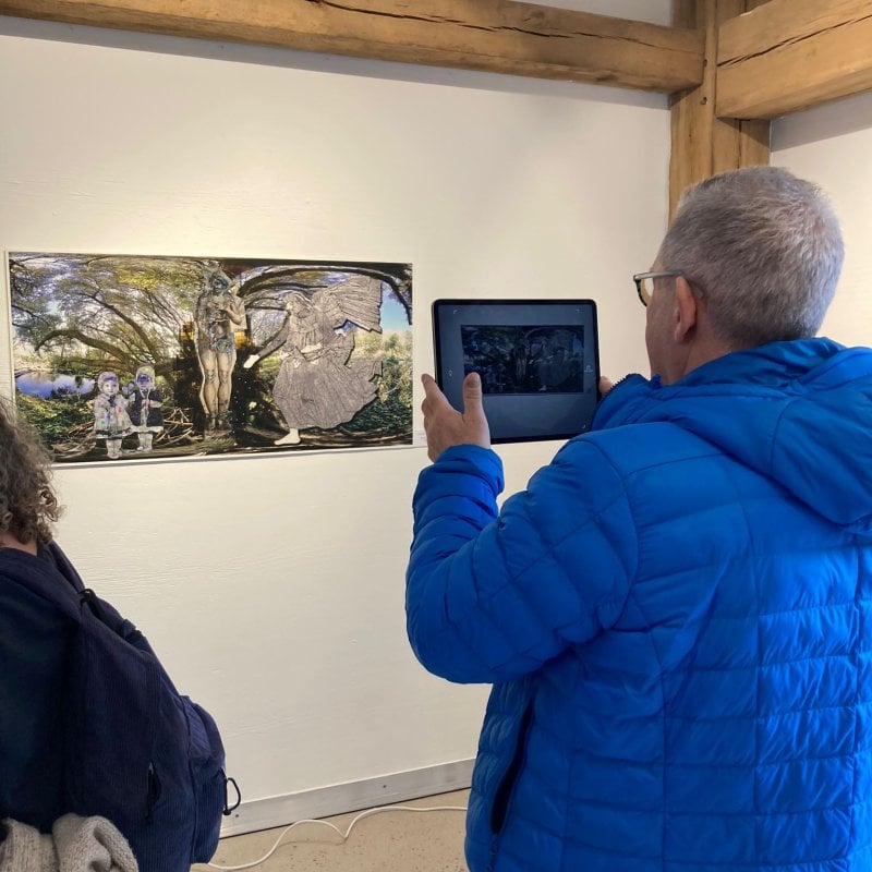 Visitor engaging with AR experience at Tremenheere