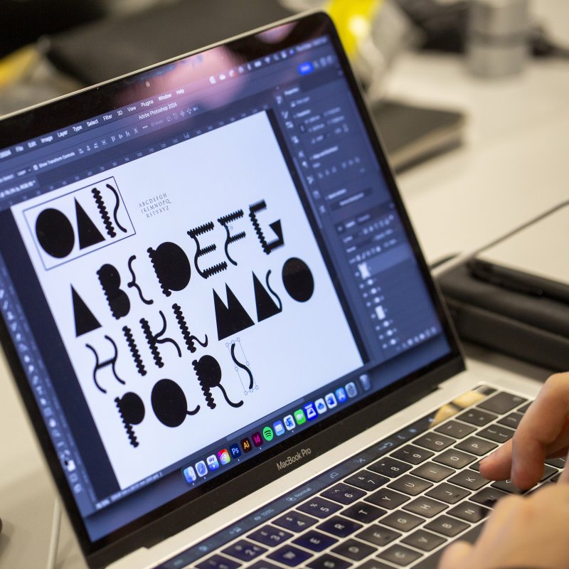 Creativity in Everything Font - work in progress laptop shot