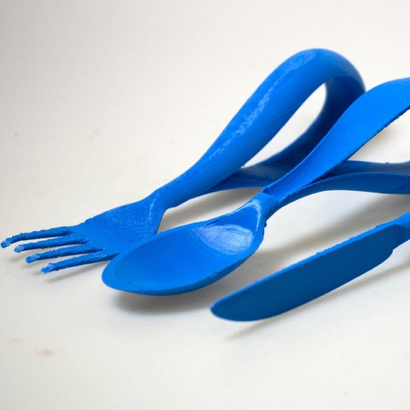 Image of blue cutlery set with curved handles