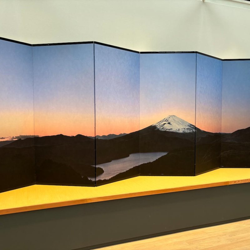 Folding screen of a photograph of Mt Fuji at sunrise