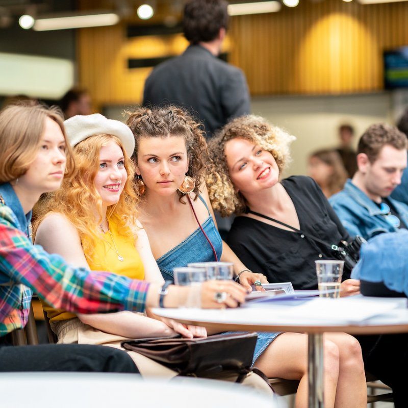 Students sitting at Falmouth Campus