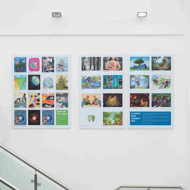 Falmouth University student artwork displayed on a white wall for the 2022 Illustration festival