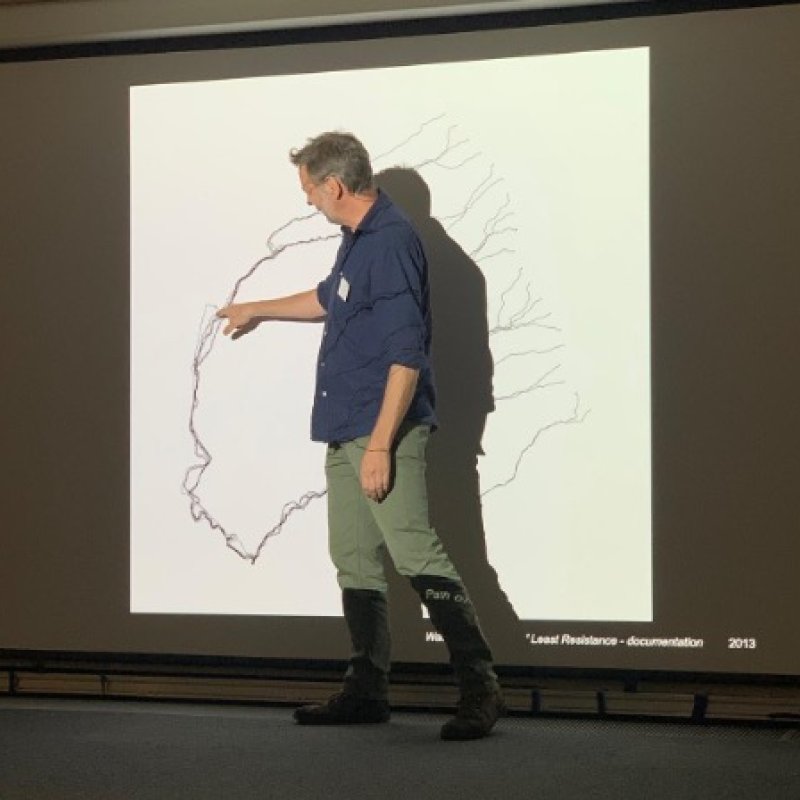 An arrist giving a talk