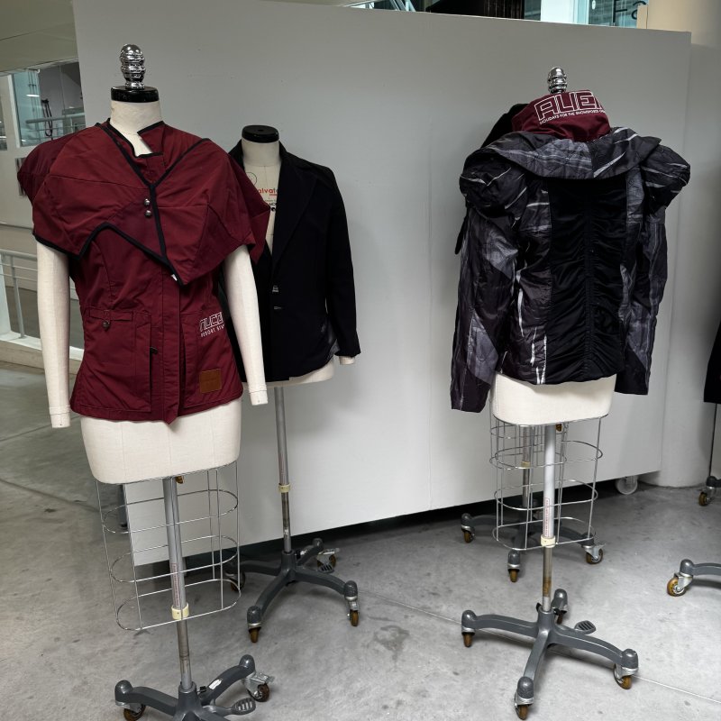 Maroon jackets on mannequins
