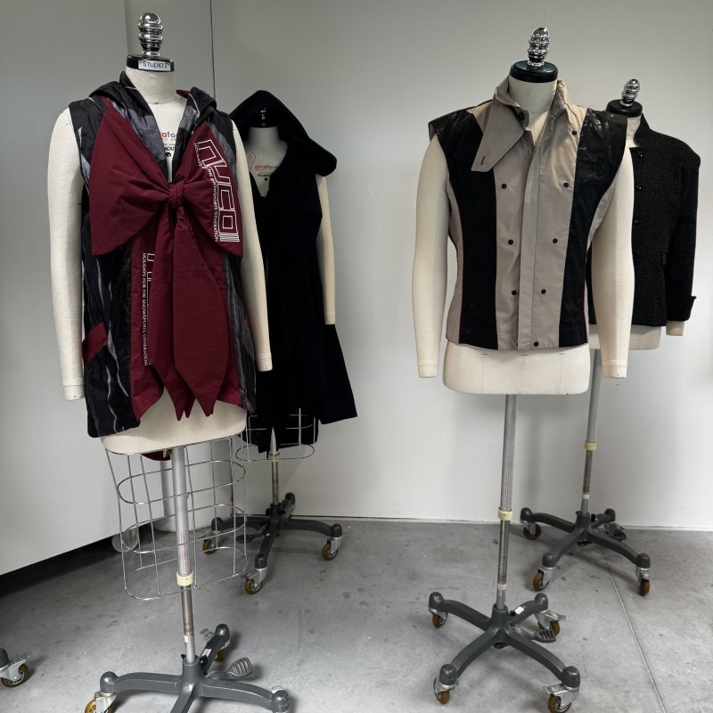 Maroon jackets on mannequins