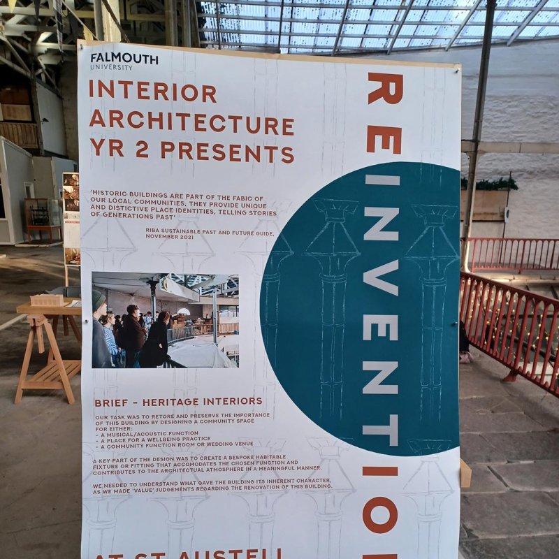 An exhibiton banner with the title 'Reinvention' by Interior Architecture students