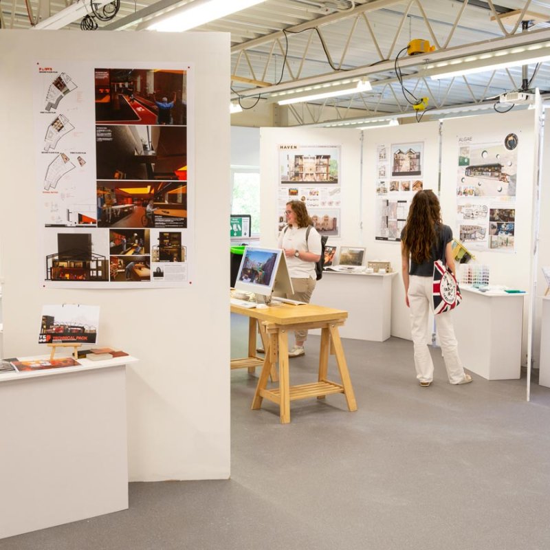 Degree show exhibition space with interior design student work on display