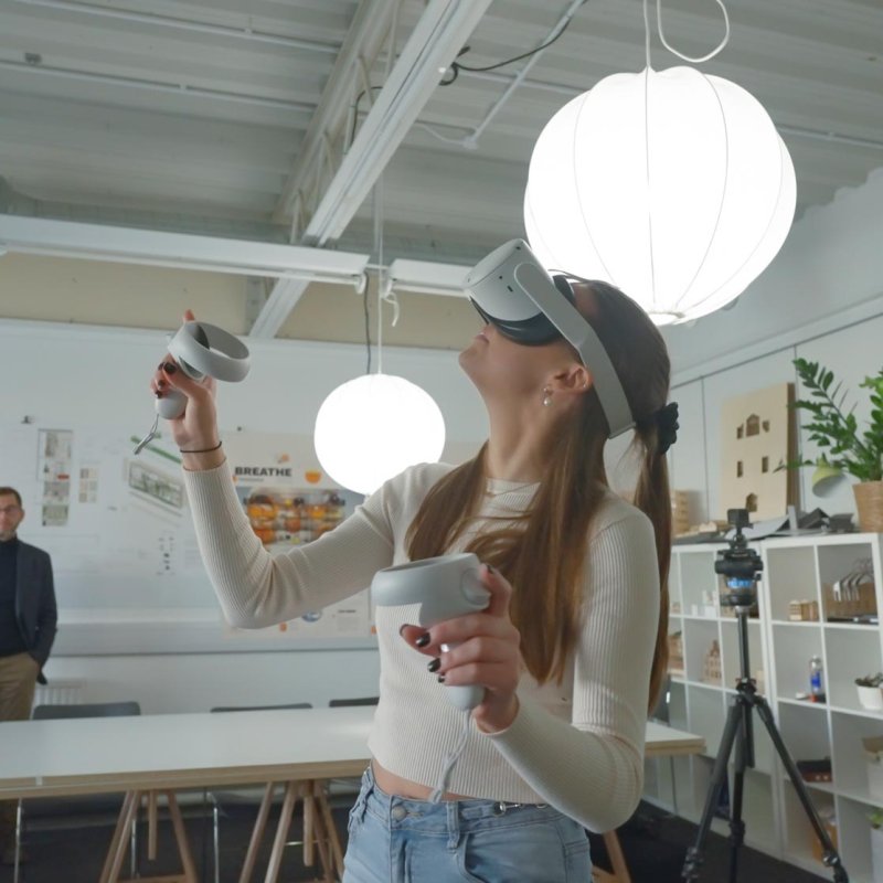 A Falmouth University student wearing a VR headset