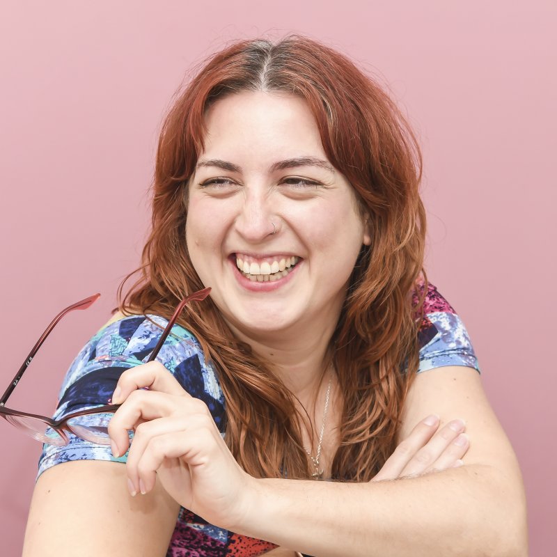 A woman smiling into camera