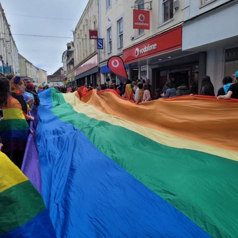 Giant LGBTQ+ flag at Falmouth Pride parade 2023