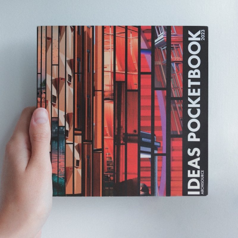 A hand holding a book titled Ideas Pocketbook