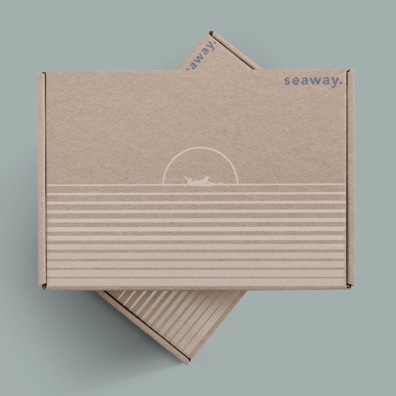 Cardboard packaging design with a surfer and the text 'seaway'