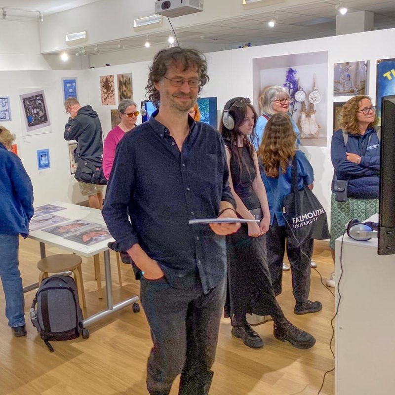 Visitors of the Landings exhibition at Falmouth University