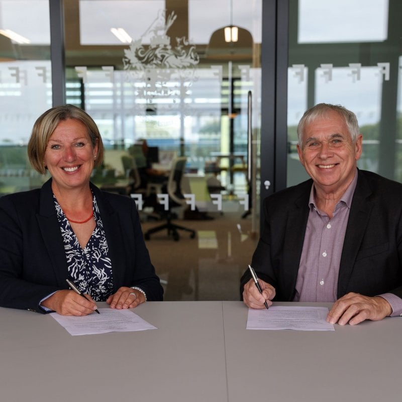 Falmouth University Vice Chancellor & Chief Executive Emma Hunt signing MOU with President of LASALLE College of the Arts Steven Dixon