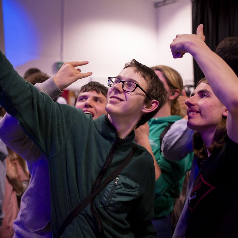 Students enjoying a performance at the LAAA event