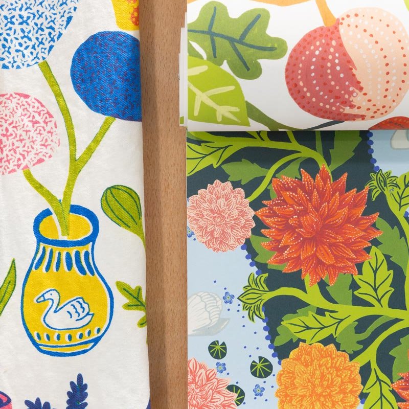 Textile design of flowers and a vase with a duck on