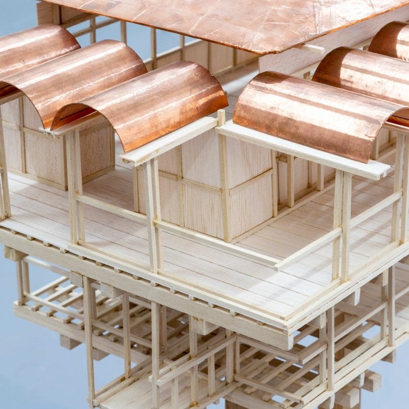 A brass and wood construction
