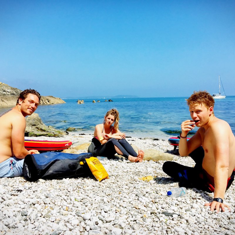 Falmouth University students on the beach