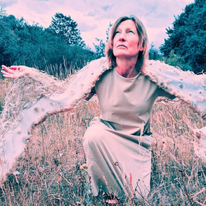 A woman in a field 