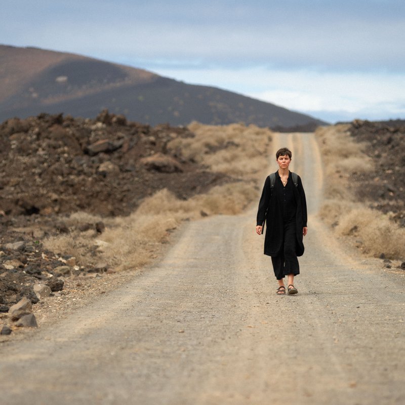 A woman stood on a road
