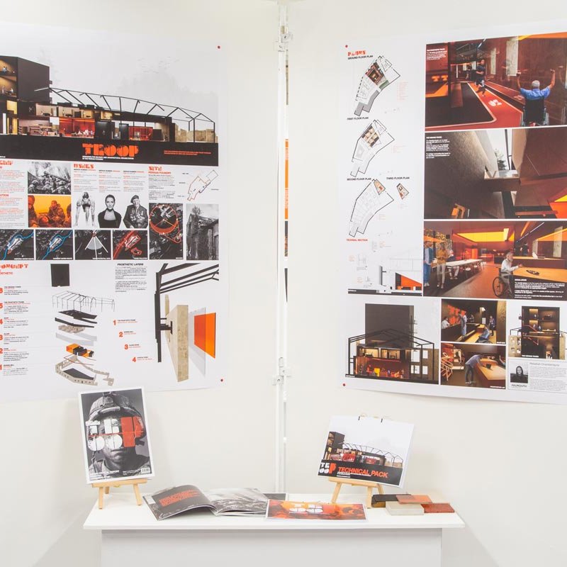 Exhibition wall featuring interior design student work at Falmouth University