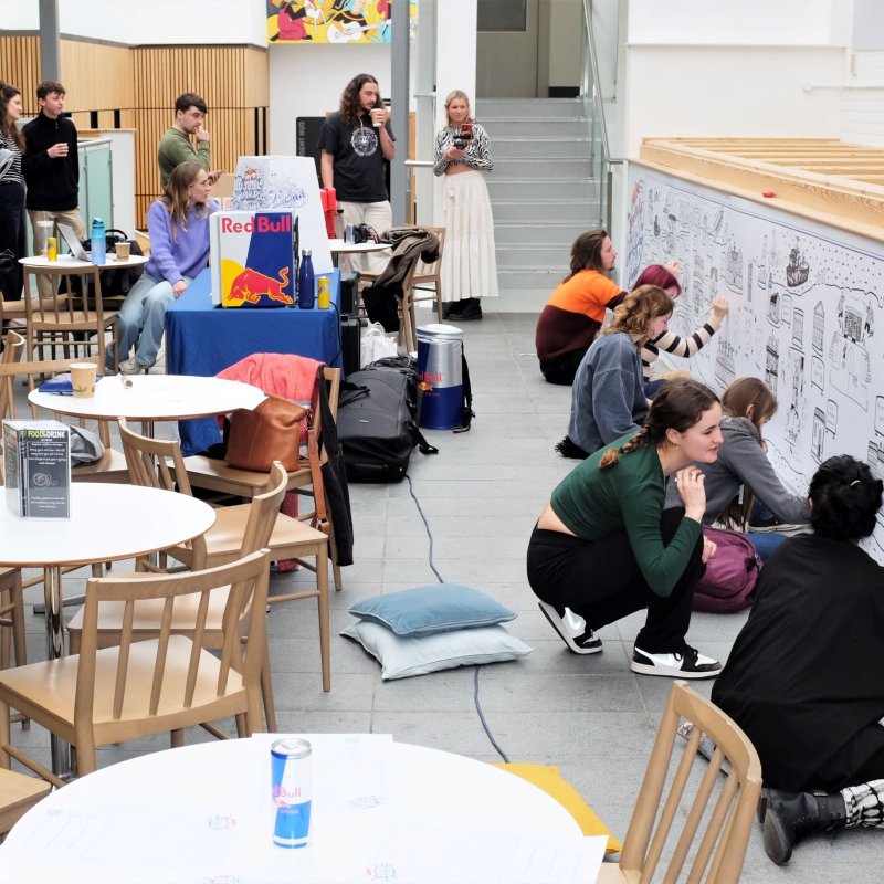 Falmouth students creating mural with Dave Draws for Red Bull Doodle Art