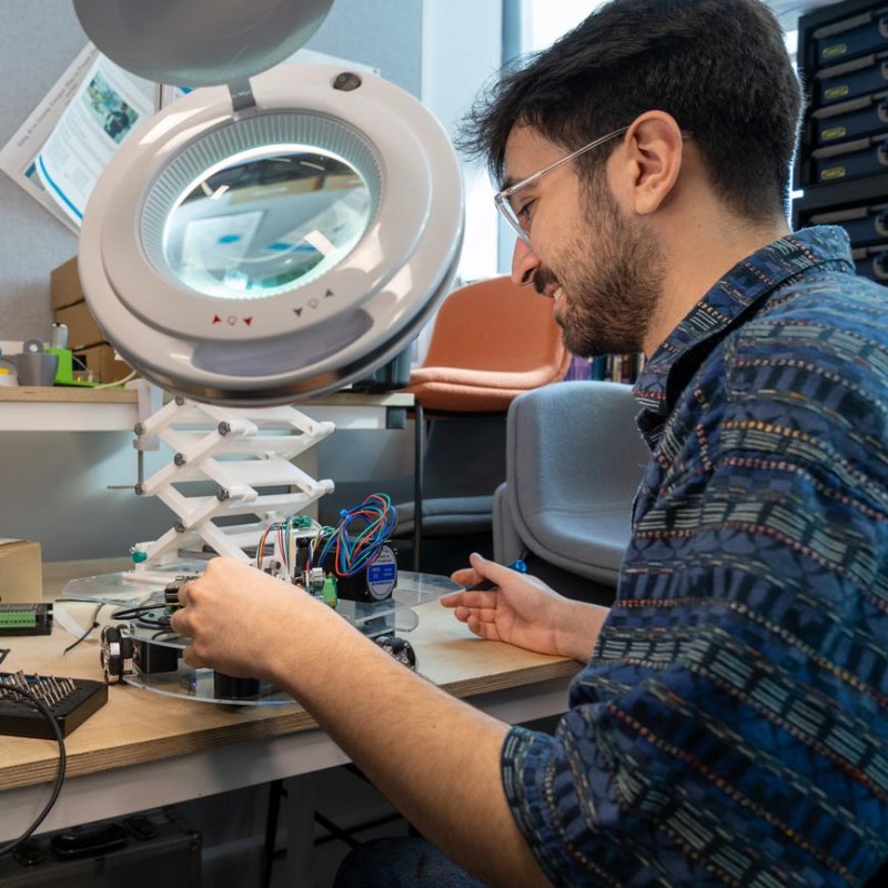 Two Falmouth University Robotics students working