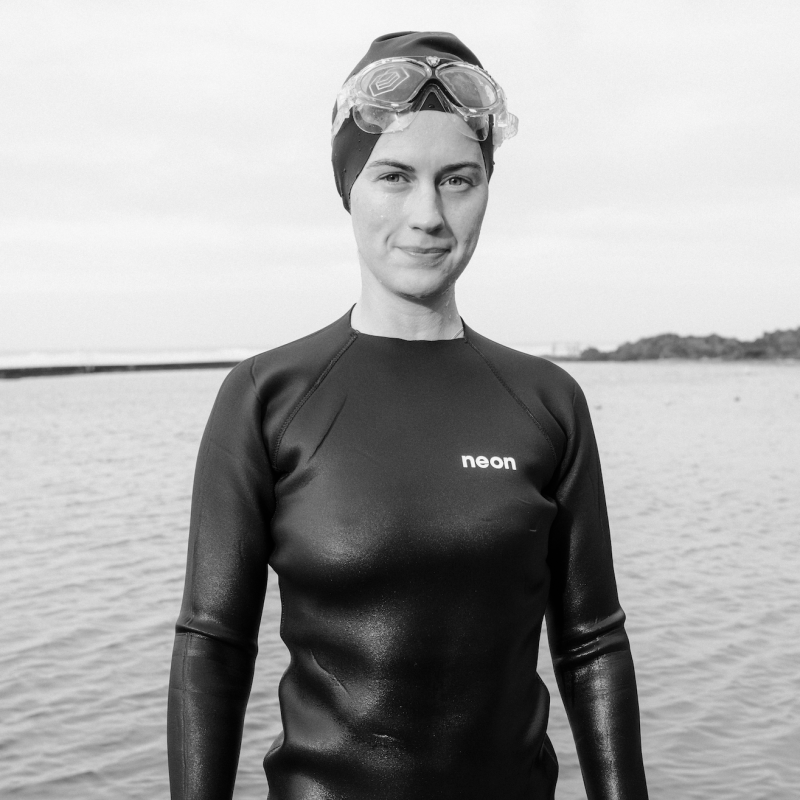 Portrait of young woman by the sea