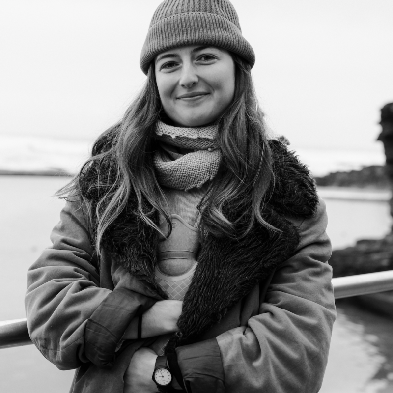 Portrait of young woman by the sea