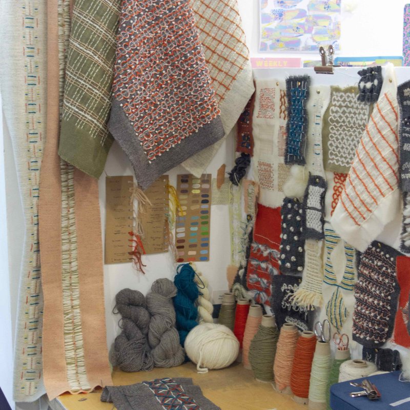 Sophie Woodfield textile design workspace showing fabric and threads