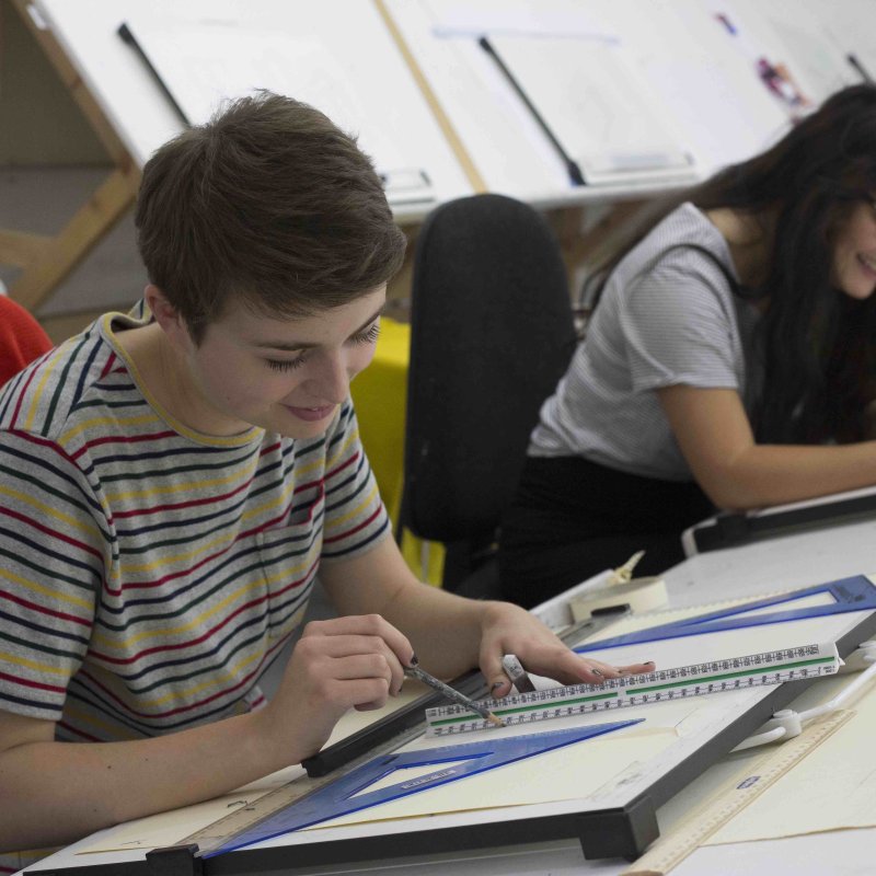 Drawing students working together