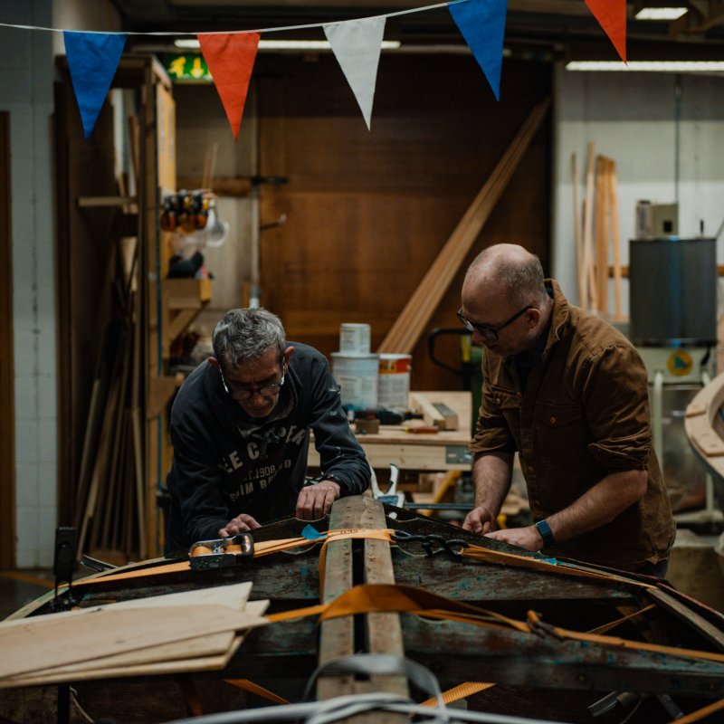Two men in a workshop