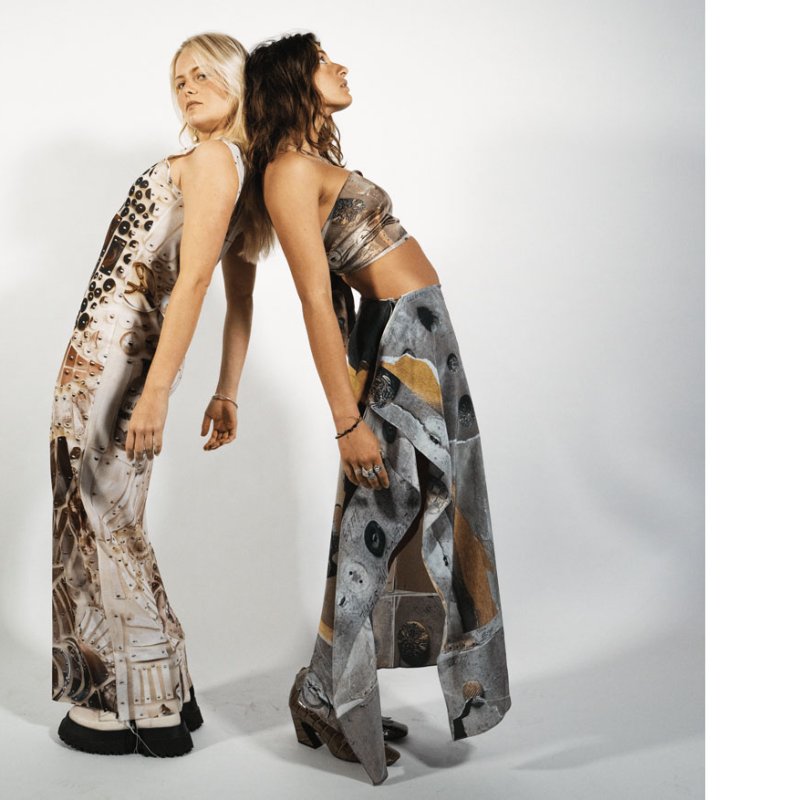 Two models wearing dresses created by Textile Design student