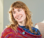 A student smiling