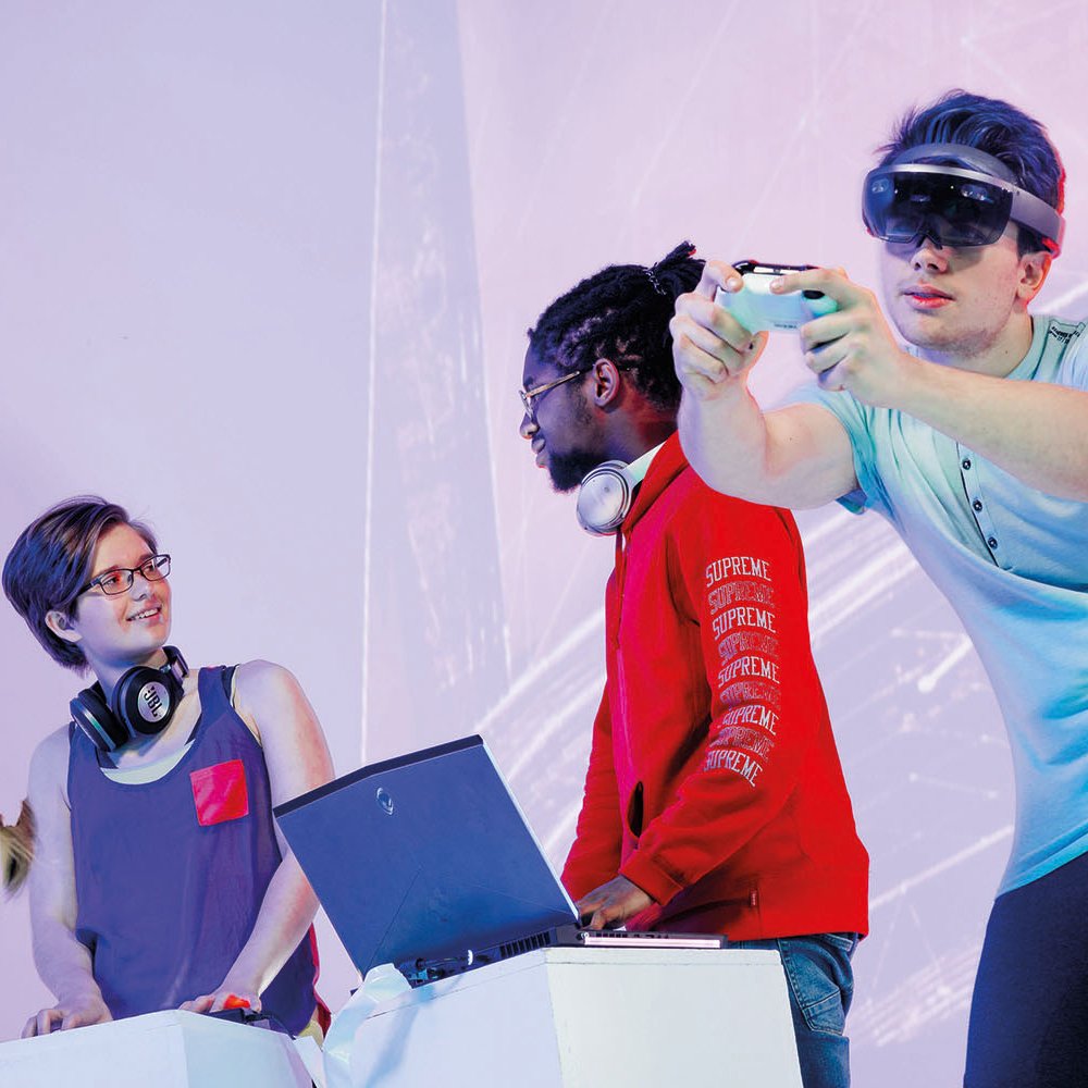 Student with VR set and hand controller