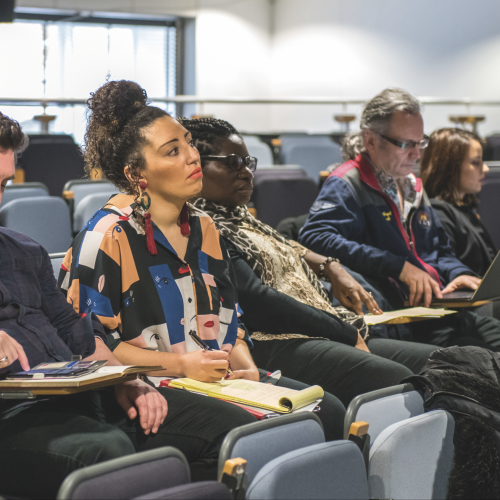 Postgraduate students in lecture theatre