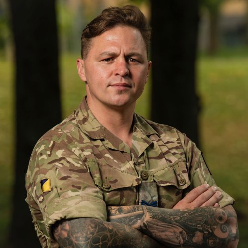 A man wearing camo 