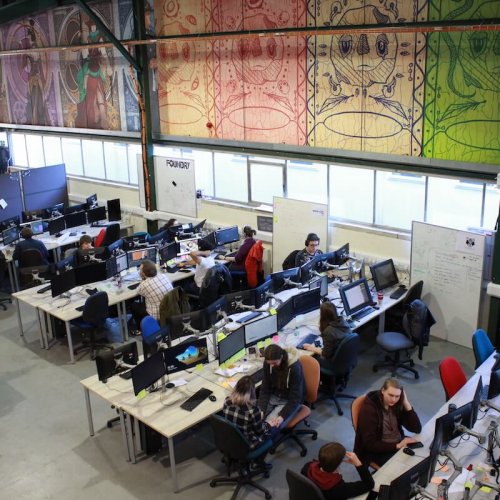 Arial view of students working in Falmouth University's Games Academy