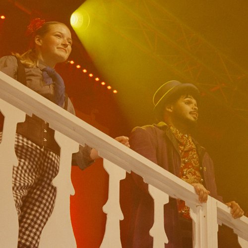 Image of two actors on stage